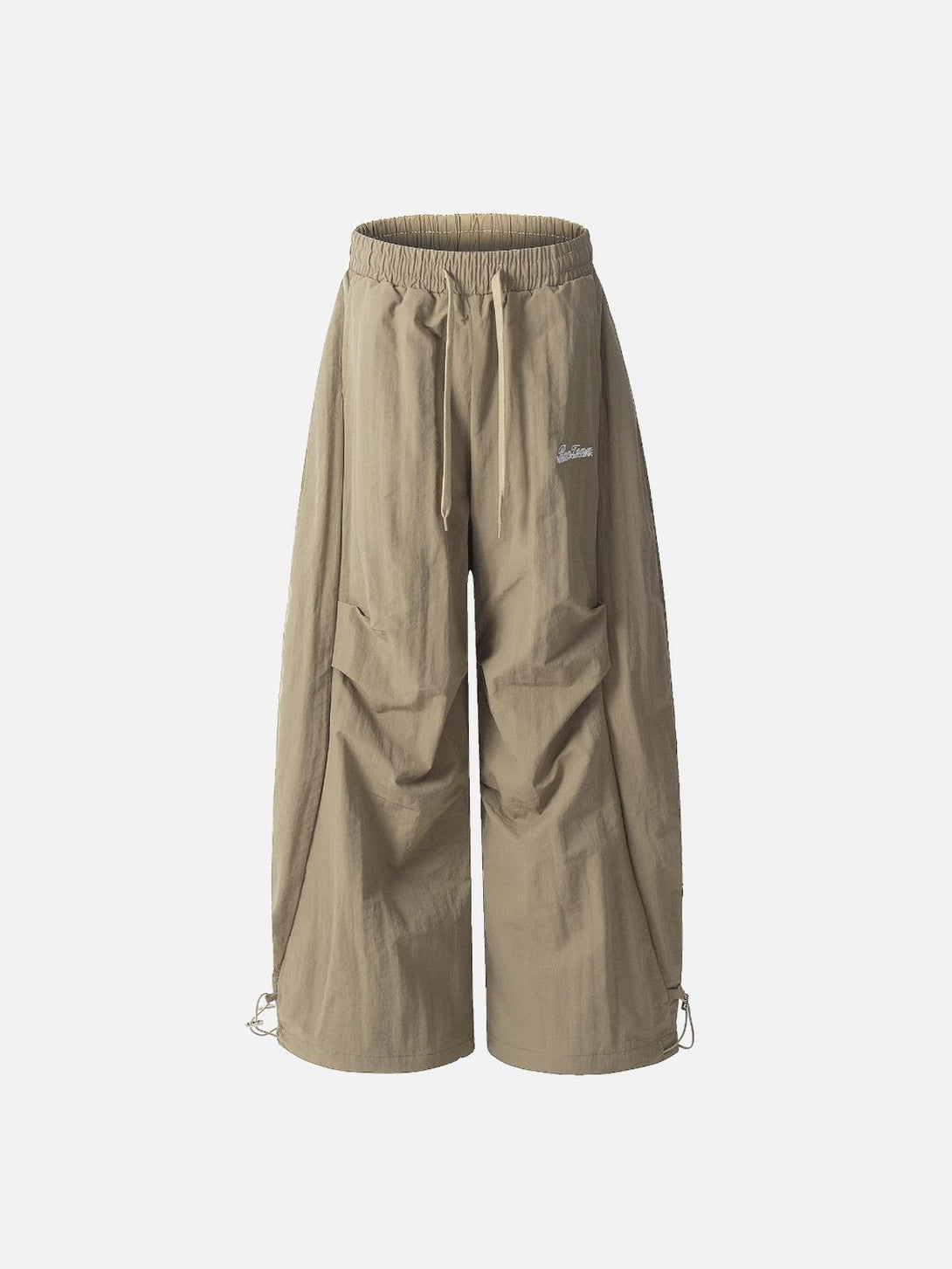 Khaki baggy pleated cargo pants by TALISHKO, front view with adjustable drawstrings.