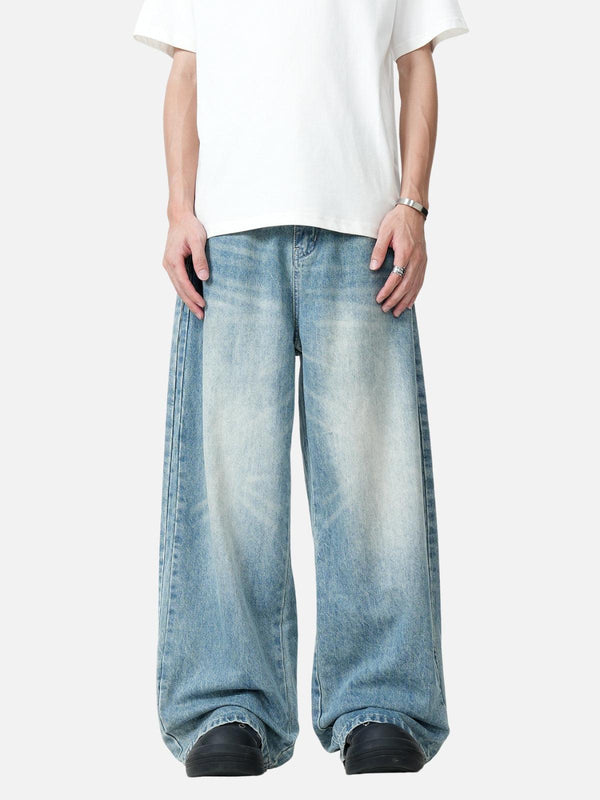 TALISHKO blue baggy jeans in a front view, highlighting their relaxed, stylish fit.