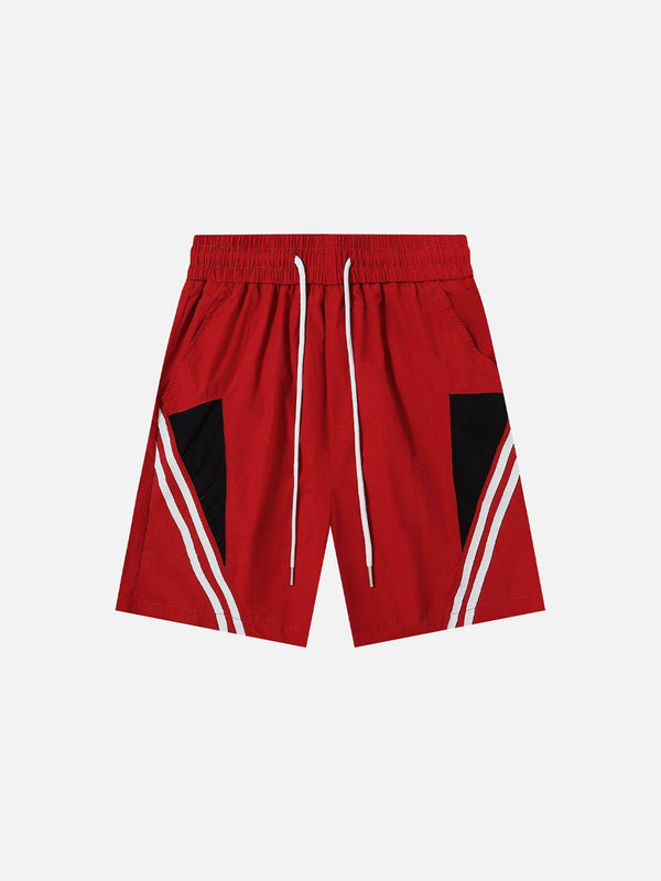 Front view of red TALISHKO shorts with black and white stripe details, ideal for warm days.