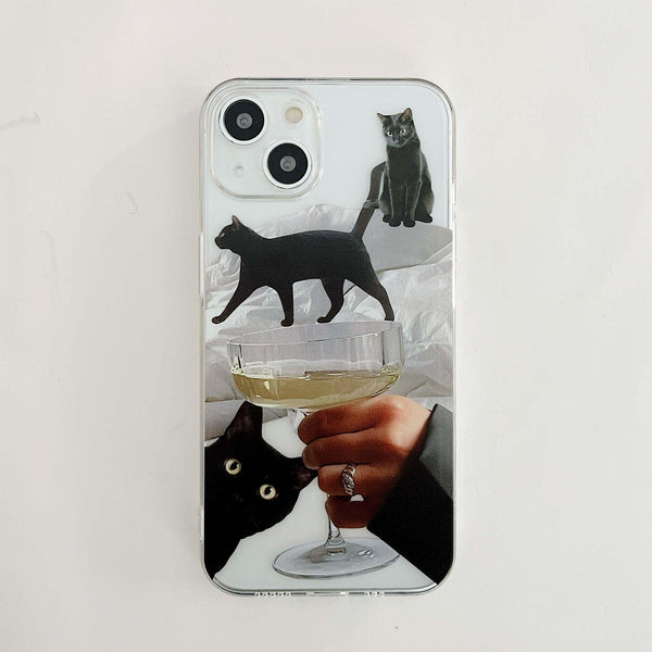 iPhone case featuring playful black cat graphics by TALISHKO, including a champagne glass motif.