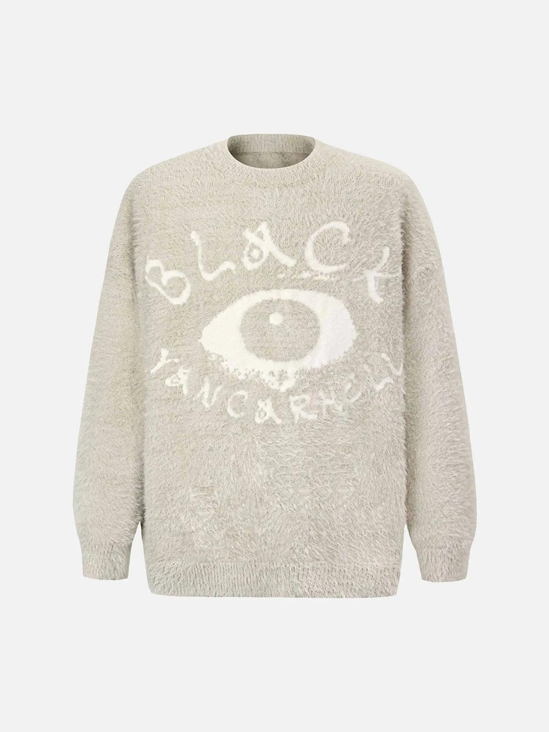 Front view of apricot sweater by TALISHKO, featuring a striking eye pattern design.