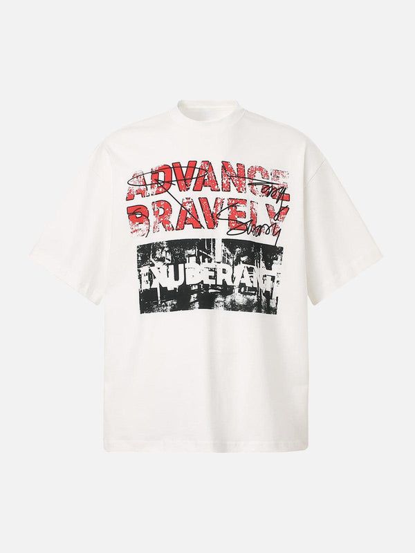 Front view of a white graphic T-shirt by TALISHKO featuring bold "Advance Bravely" text.