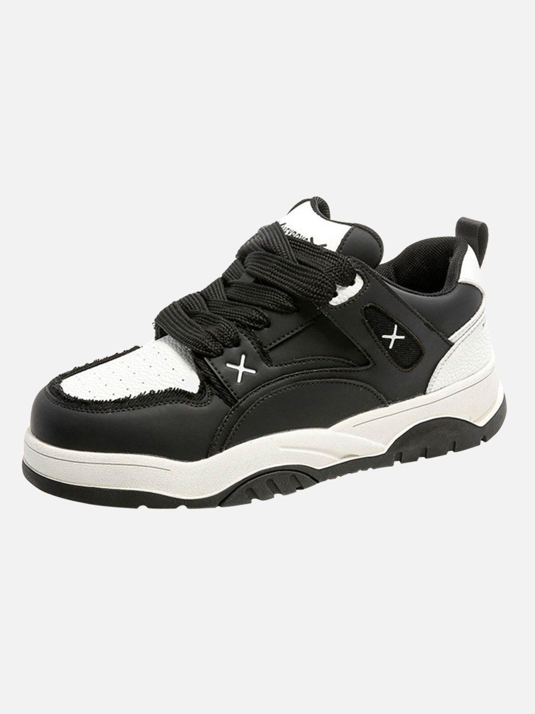 Black and white board shoes by TALISHKO, featuring a thick sole and versatile design.