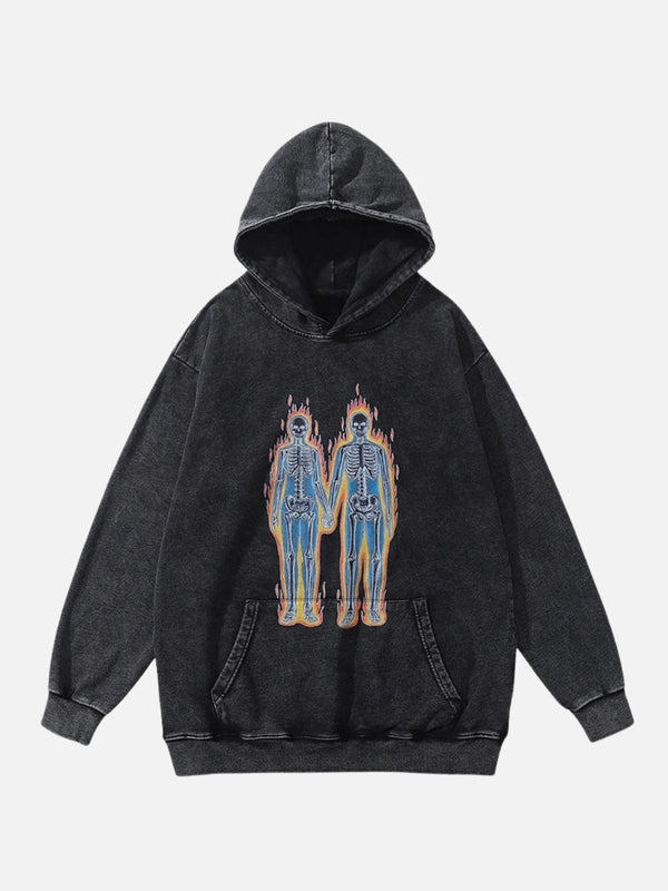 Front view of black hoodie featuring a flaming skeleton graphic, designed by TALISHKO.