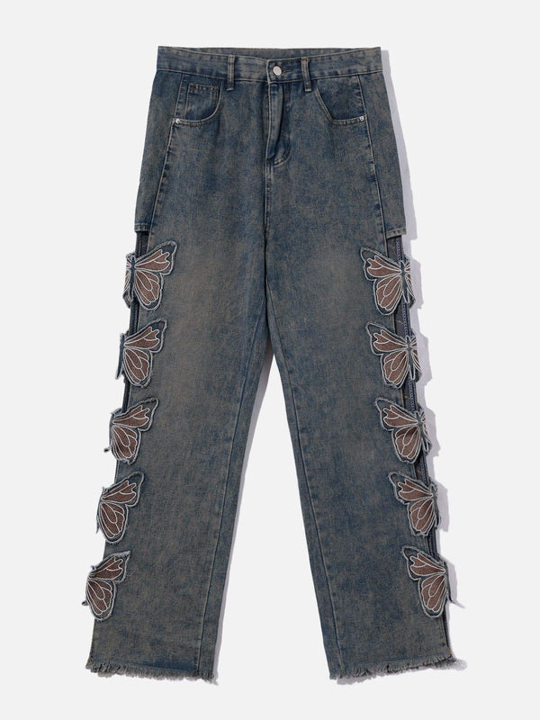 Front view of TALISHKO blue jeans featuring butterfly cutouts on the legs, perfect for urban style.