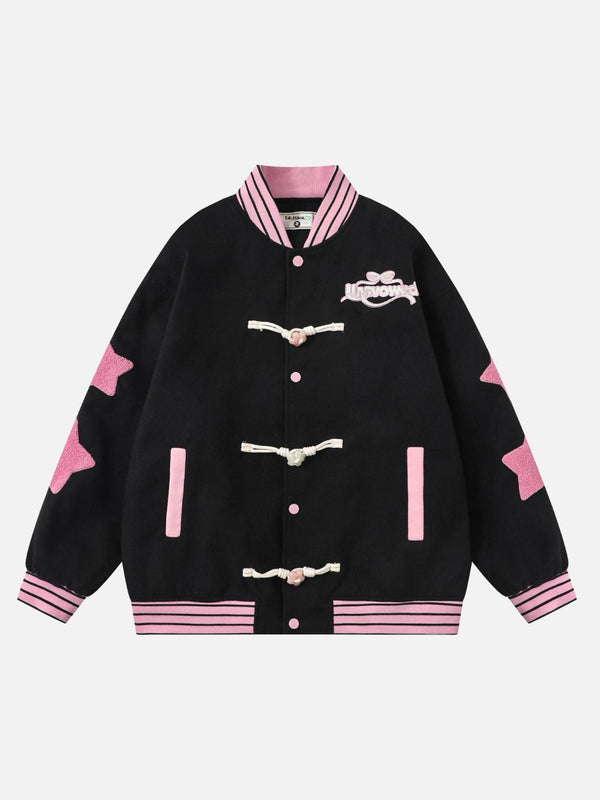 Front view of a black baseball jacket with pink star embroidery and toggle buttons by TALISHKO.