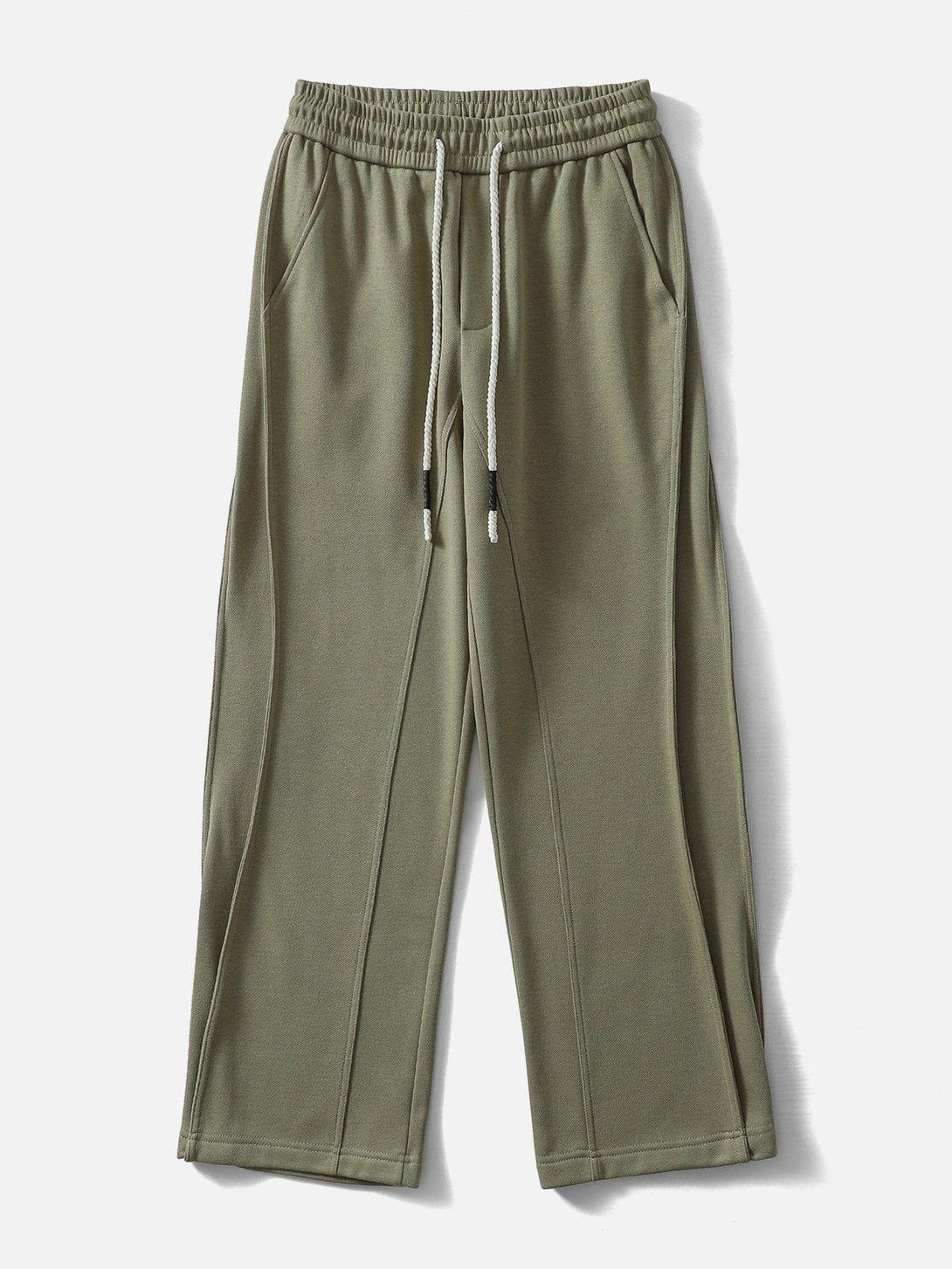 Green Camber Cutting Sweatpants by TALISHKO, front view, featuring relaxed fit and drawstring waist.