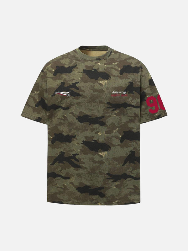 Front view of a green camouflage print T-shirt by TALISHKO, featuring bold red accents.