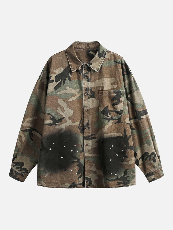 Front view of a green camouflage denim shirt by TALISHKO, featuring a distressed design.