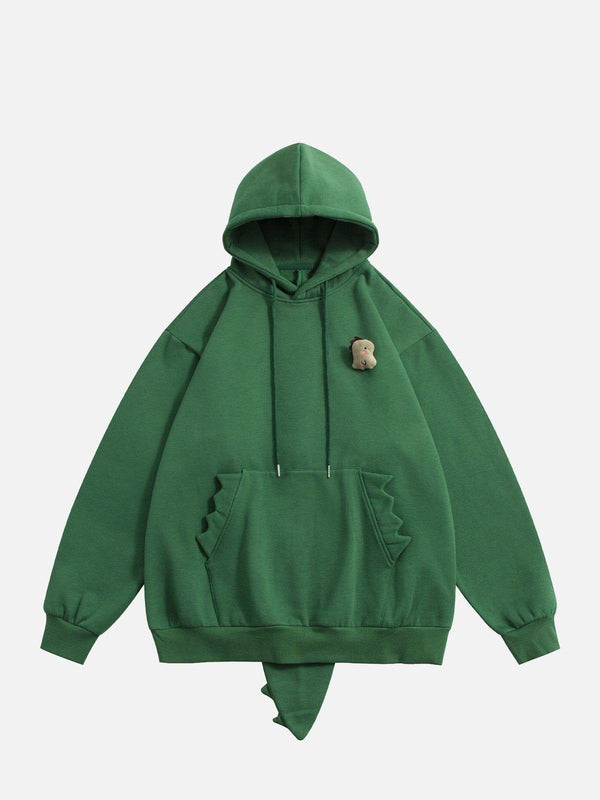 Front view of a dark green TALISHKO hoodie with dinosaur details, adding playful street style.