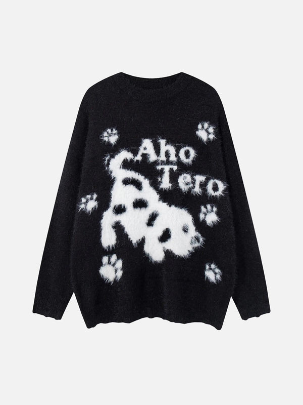 Front view of a black cartoon puppy sweater by TALISHKO, featuring playful paw prints.