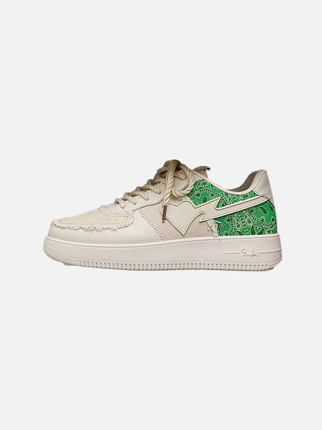 TALISHKO canvas shoes in green with patchwork details, showcasing a unique side profile.