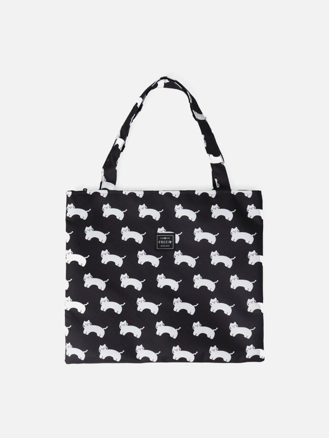 A stylish black canvas shoulder bag by TALISHKO, featuring an all-over white cat print.