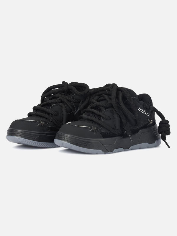 Front view of black chunky rope shoes by TALISHKO, perfect for urban style enthusiasts.