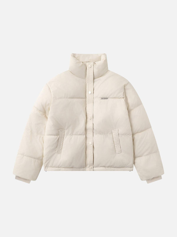 Front view of a TALISHKO apricot puffer coat with a classic stand collar, perfect for urban style.