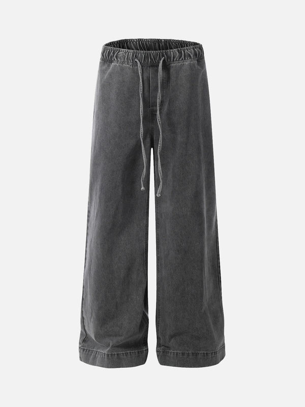 TALISHKO dark gray baggy jeans with a drawstring waist, shown in a front view for a relaxed style.