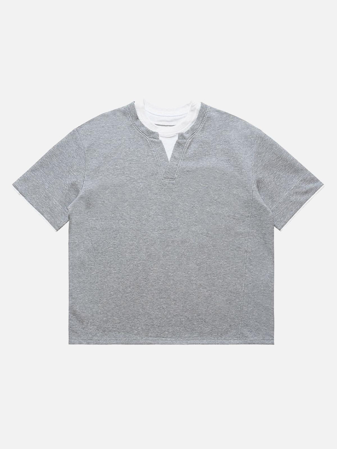 Front view of a light gray TALISHKO oversized t-shirt with a faux layered design.