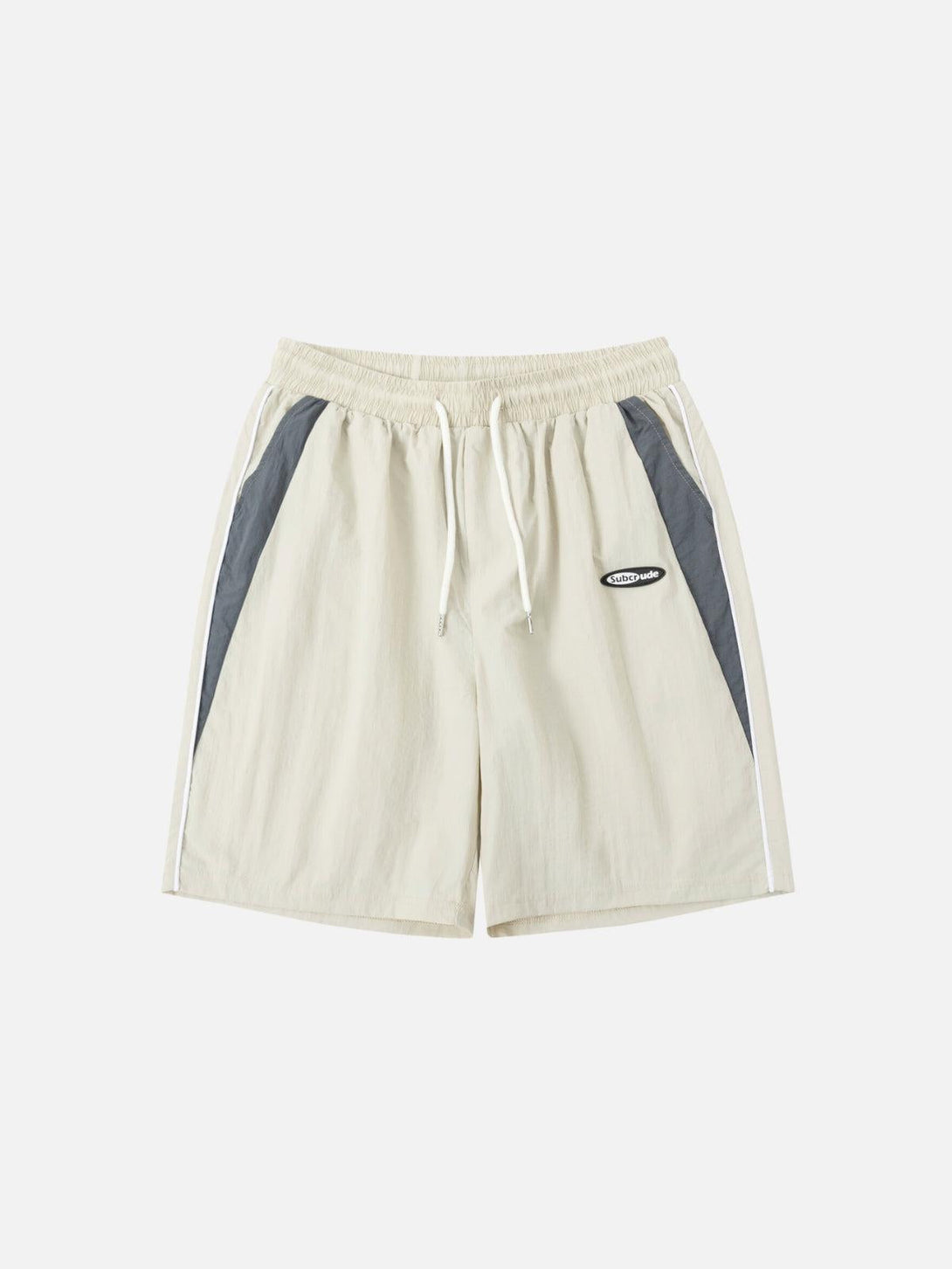 Front view of apricot color blocking shorts by TALISHKO, featuring white drawstrings.