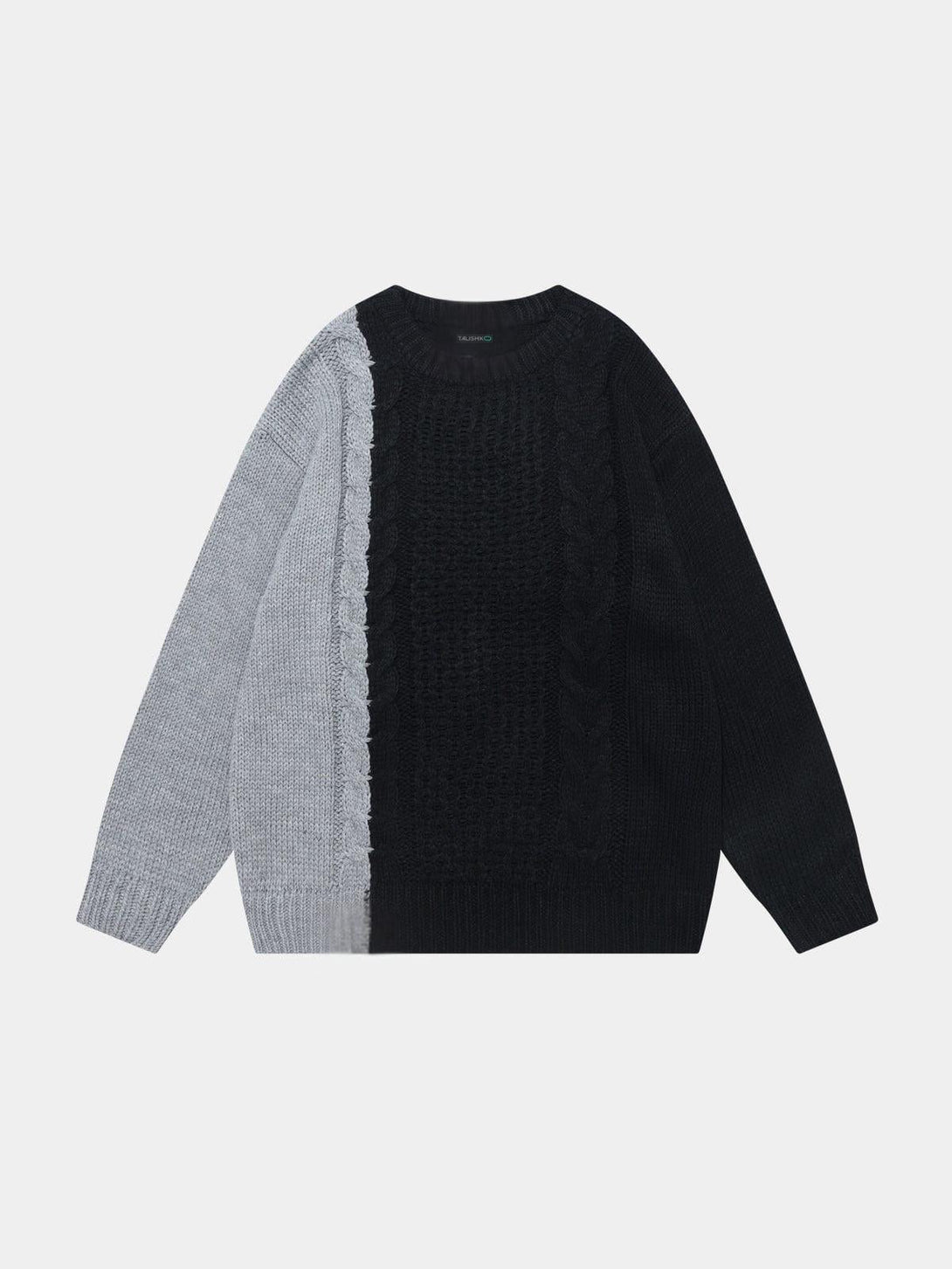 Front view of a TALISHKO sweater with black and gray color-blocking and cable knit details.