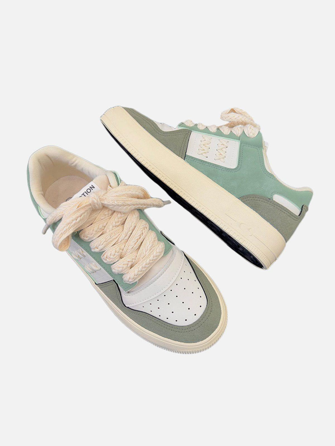 TALISHKO green skate shoes featuring rope trim and colorblock design in a stylish front view.