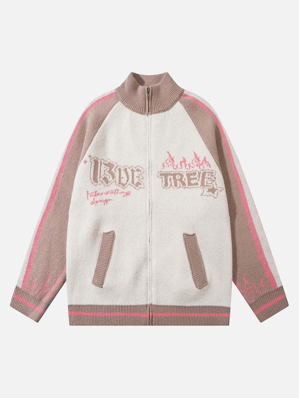 Front view of TALISHKO pink jacquard mock neck zipper sweater, showcasing contrast colors.