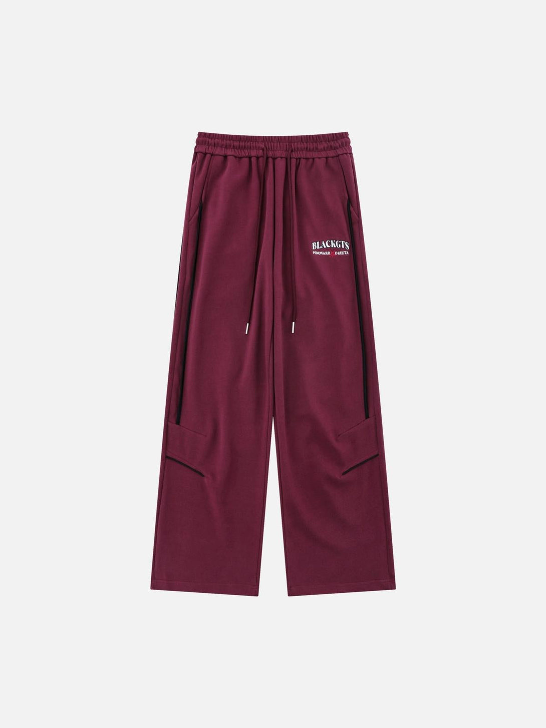 Front view of red loose sweatpants with subtle logo detail by TALISHKO, perfect for casual style.