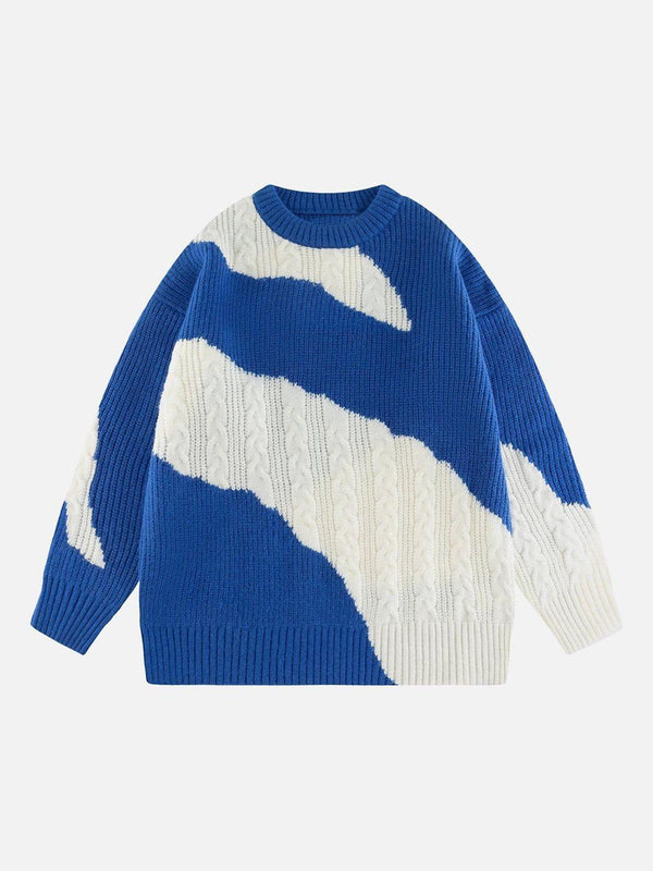 Front view of a blue and white knit sweater by TALISHKO, featuring an irregular design.