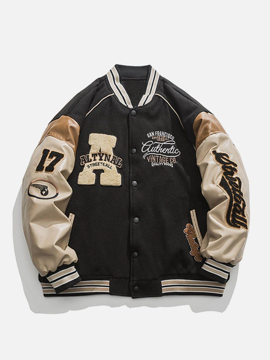 Front view of a TALISHKO black varsity jacket with bold patches and contrast sleeves.