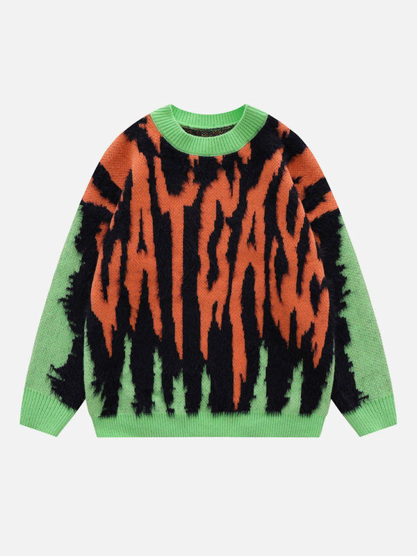 Front view of a bold green TALISHKO sweater featuring a vivid zebra plush print design.