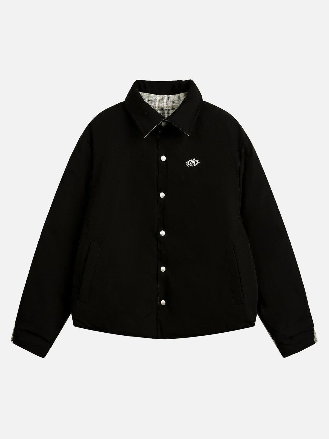 Front view of a black cotton reversible jacket by TALISHKO, showcasing a sleek, modern design.