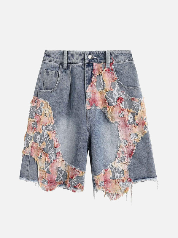 Front view of TALISHKO blue denim shorts with ripped floral detailing, ideal for warm days.