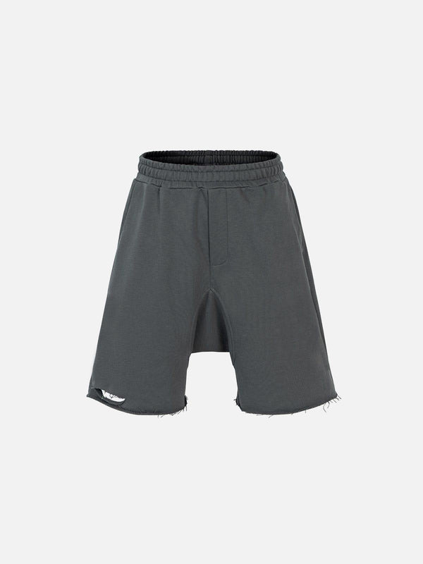 Front view of gray cut distressed shorts by TALISHKO, featuring a relaxed fit and frayed edges.