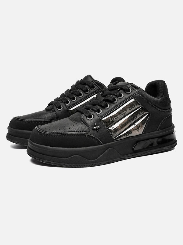 Black skate shoes with embroidered details, featuring sleek design by TALISHKO.