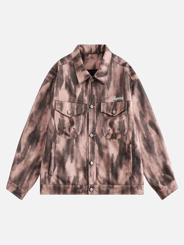 Front view of a pink suede utility jacket by TALISHKO, featuring a dark graffiti pattern.