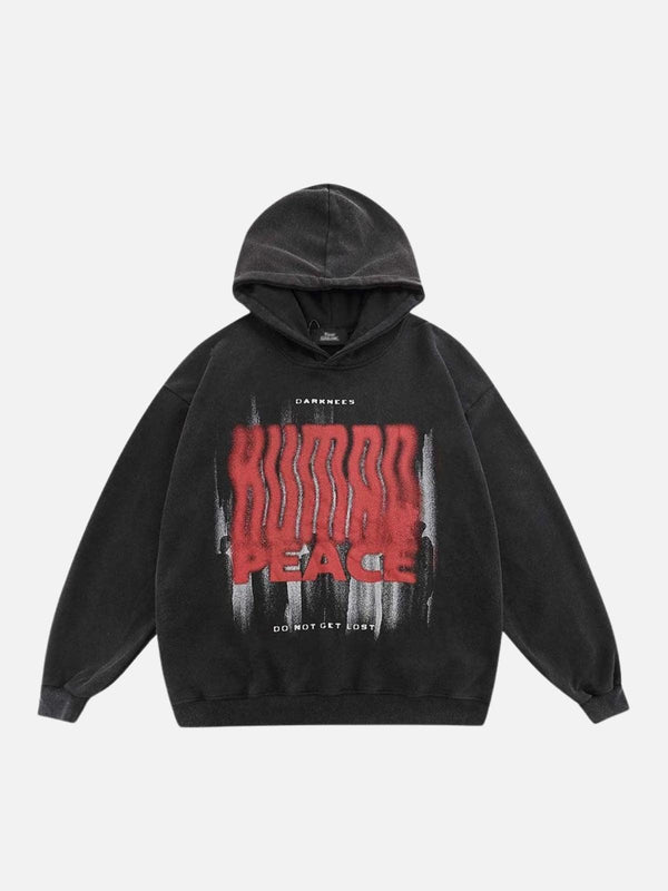 Front view of TALISHKO black hoodie featuring a bold red graphic design, ideal for urban style.
