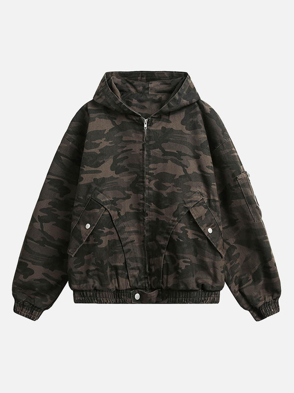 Front view of a camouflage hooded jacket by TALISHKO, showcasing a deconstructed workwear style.