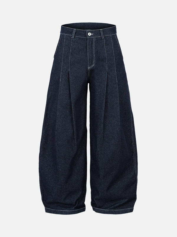 Front view of dark blue baggy barrel jeans with contrast stitching, designed by TALISHKO.