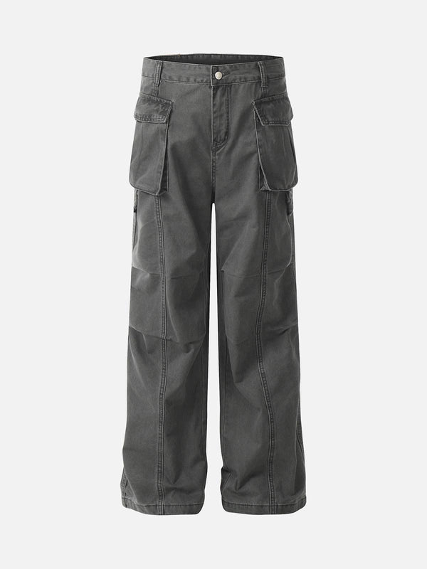 Front view of dark gray deconstructed cargo pants with multiple pockets by TALISHKO.