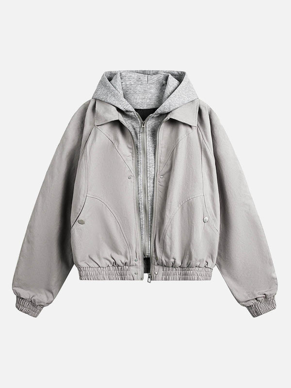 Light gray hooded jacket by TALISHKO, showcasing a deconstructed, layered street style.