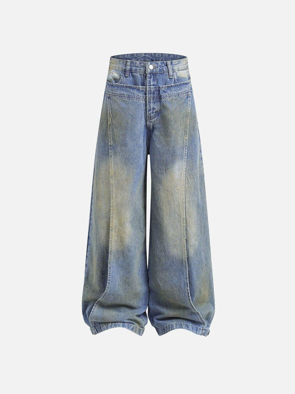 Front view of blue deconstructive patchwork jeans by TALISHKO, featuring a wide-leg design.