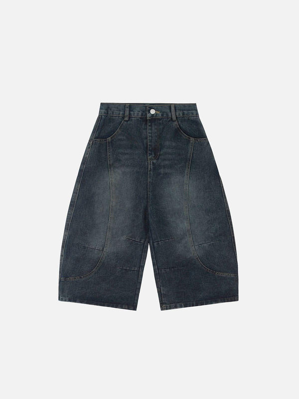 Front view of TALISHKO blue deconstructive washed longline jorts, showcasing unique design.