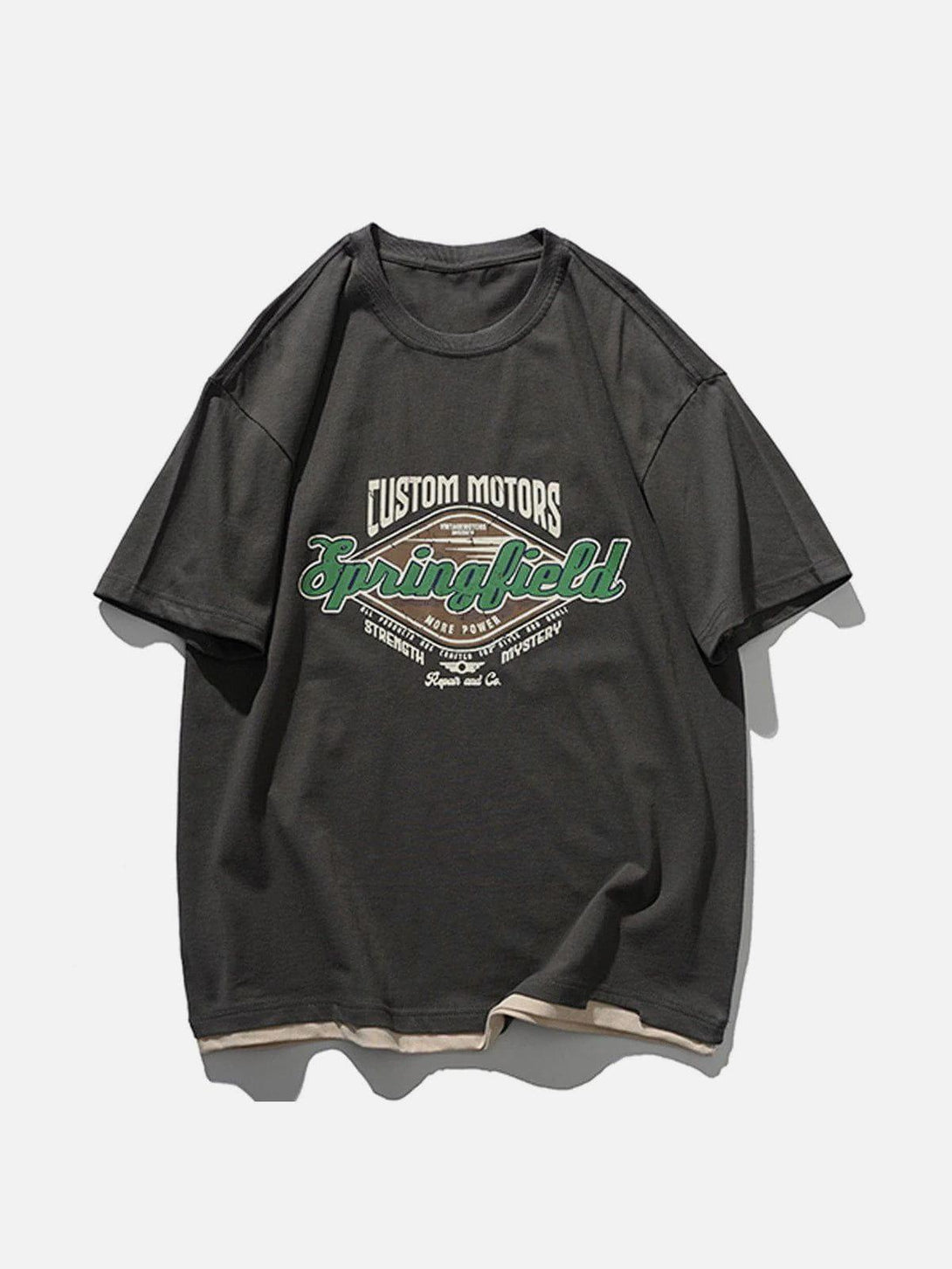 Front view of a dark gray graphic tee by TALISHKO, featuring bold lettering and casual design.