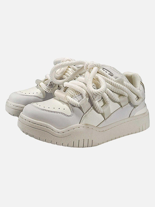 Front view of white skateboard shoes with unique braided design by TALISHKO.