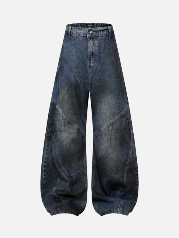 Front view of TALISHKO dark blue baggy barrel jeans, showcasing a relaxed street style.