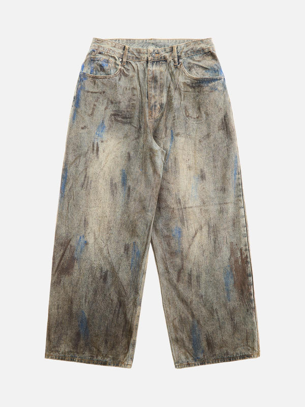 Front view of TALISHKO's gray baggy jeans with a unique dirty-dyed pattern, perfect for urban style.