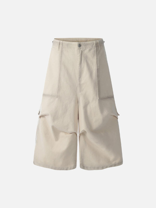 Front view of apricot cargo jorts by TALISHKO, featuring a multi-pocket design for casual style.