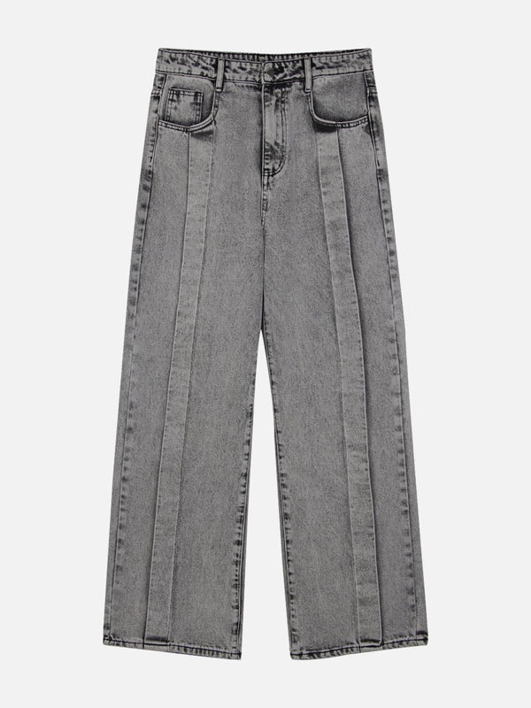 Front view of gray distressed patchwork jeans by TALISHKO, showcasing a unique street style.