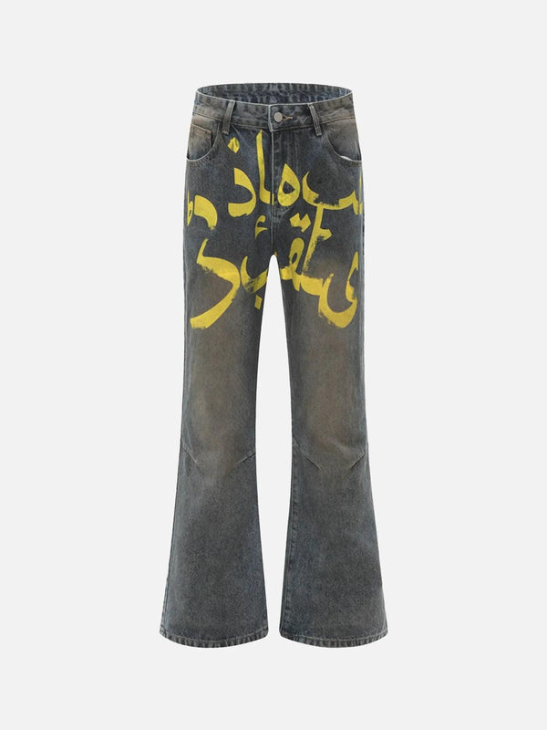 Front view of blue TALISHKO bootcut jeans with bold yellow graphic print for urban style.