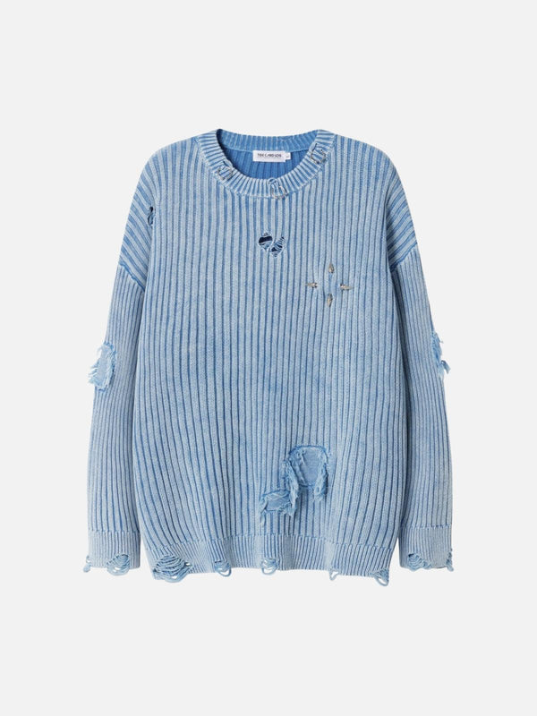 Front view of a blue distressed sweater with ripped details and rivets by TALISHKO.