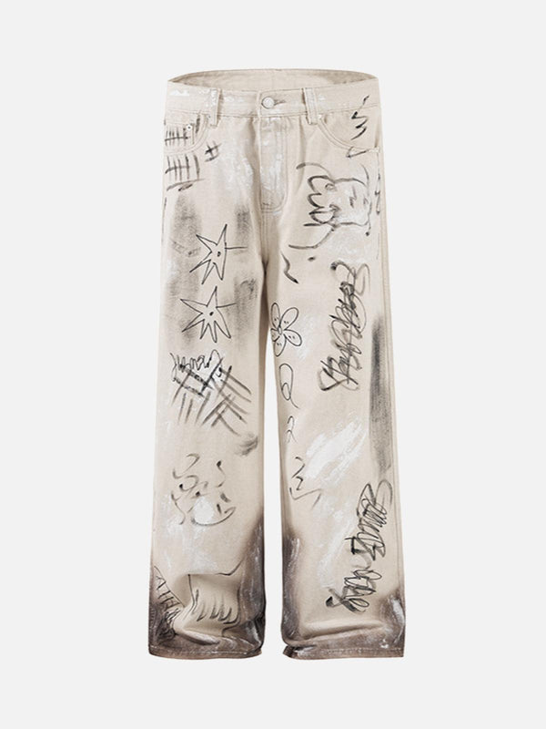 Light brown baggy jeans with graffiti print by TALISHKO, showcasing a relaxed street style.